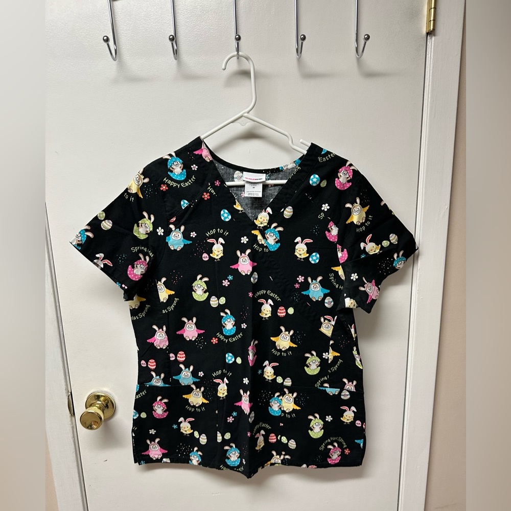 Women’s scrub top, excellent condition.